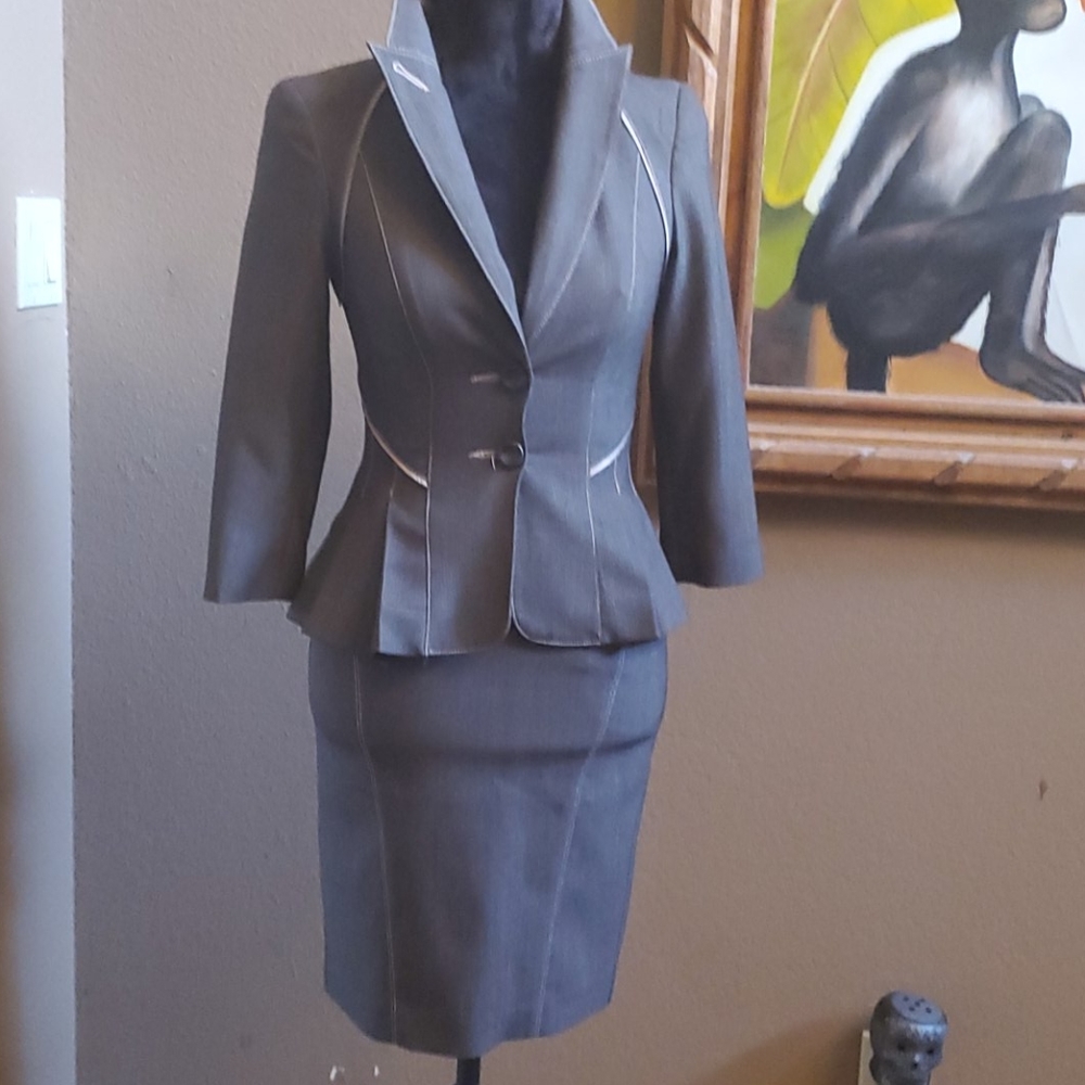 Elegant taupe peplum tailored suit